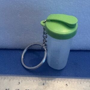 Tupperware Lime Green Keychain Container